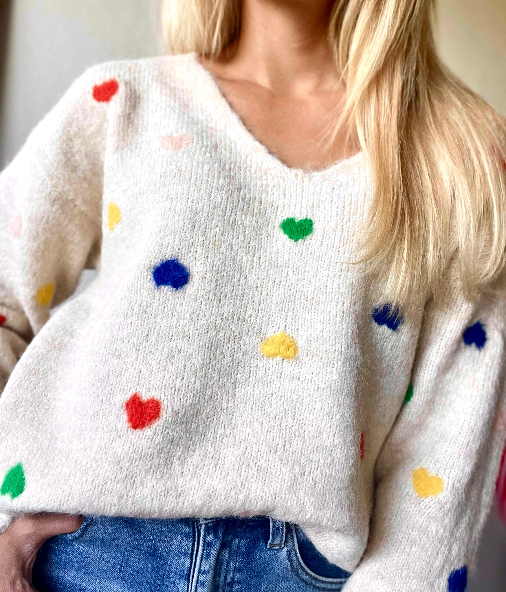 beige trui met hartjes